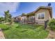 Spacious backyard with manicured lawn and privacy fence, perfect for outdoor enjoyment and relaxation at 15852 Lavender Pl, Broomfield, CO 80023