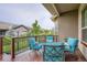 Comfortable outdoor deck with cushioned chairs, offering a relaxing retreat and a place for entertainment at 15852 Lavender Pl, Broomfield, CO 80023