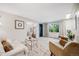 Spacious living room featuring an open layout and ample natural light at 2440 Saulsbury St, Lakewood, CO 80214