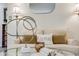 Comfortable couch with decorative pillows, lamps and modern art at 2440 Saulsbury St, Lakewood, CO 80214