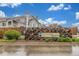 Charming Canyon Ranch community sign surrounded by stone and greenery at 8465 Pebble Creek Way # 102, Highlands Ranch, CO 80126