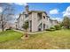 Condominium building with landscaped grounds, private balconies, and convenient access to parking at 8465 Pebble Creek Way # 102, Highlands Ranch, CO 80126