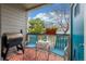 Cozy patio with grill, seating and pleasant view at 8465 Pebble Creek Way # 102, Highlands Ranch, CO 80126