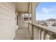 Cozy porch offers a relaxed entryway with views of the neighborhood street at 13000 W Grant Cir # C, Thornton, CO 80241