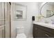 Modern bathroom featuring a glass shower and a sleek vanity at 929 Coneflower Dr, Golden, CO 80401