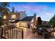 Picture of the back of a home showcasing an expansive deck, perfect for entertaining, nestled in a wooded setting at 929 Coneflower Dr, Golden, CO 80401