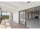 Bright balcony leading to the living room with sliding glass door at 7865 E Mississippi Ave # 1502, Denver, CO 80247