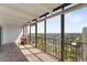 Enjoy the views from this spacious balcony with tile floor and metal railing at 7865 E Mississippi Ave # 1502, Denver, CO 80247