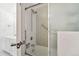 Bright bathroom featuring a shower and tub with modern fixtures at 7865 E Mississippi Ave # 1502, Denver, CO 80247