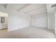 Large bedroom featuring neutral carpet with ensuite bathroom at 7865 E Mississippi Ave # 1502, Denver, CO 80247