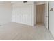 Spacious bedroom featuring neutral carpet and lots of closet space at 7865 E Mississippi Ave # 1502, Denver, CO 80247