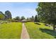 Beautifully maintained community lawn with a gazebo and walking path at 7865 E Mississippi Ave # 1502, Denver, CO 80247