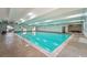 Large indoor swimming pool with access to spa and sauna at 7865 E Mississippi Ave # 1502, Denver, CO 80247