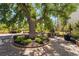 Outdoor seating area with brick pavers and mature landscaping, a perfect spot to relax at 7865 E Mississippi Ave # 1502, Denver, CO 80247
