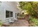 Relaxing back patio area with outdoor seating and steps leading to the garden at 8888 W 37Th Pl, Wheat Ridge, CO 80033