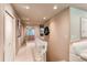 Hallway with stairs, recessed lighting, and neutral-toned walls at 8888 W 37Th Pl, Wheat Ridge, CO 80033