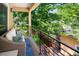 Relaxing balcony with comfortable seating and views of lush greenery at 1156 S Columbine St, Denver, CO 80210