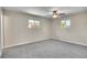 Neutral bedroom featuring plush carpet and a ceiling fan with a light at 9099 W Harvard Pl, Lakewood, CO 80227