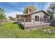 Lovely backyard deck, perfect for relaxing and enjoying the outdoors at 9099 W Harvard Pl, Lakewood, CO 80227