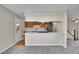An eat-in kitchen featuring stainless steel appliances and plenty of countertop space at 9099 W Harvard Pl, Lakewood, CO 80227