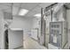 Utility room featuring a washer, dryer, sink, toilet, water heater and furnace at 9099 W Harvard Pl, Lakewood, CO 80227