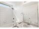 Clean bathroom with shower/tub combo, vanity, and toilet at 4849 Halifax Ct, Denver, CO 80249