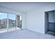 Bright, airy bedroom with balcony access and neutral decor at 1823 Grove St, Denver, CO 80204