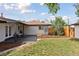 Backyard showing lawn, patio, and well-maintained landscaping at 3440 N Harrison St, Denver, CO 80205
