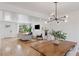 Open-concept living and dining areas showcase hardwood floors and a neutral color palette at 3440 N Harrison St, Denver, CO 80205