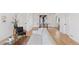 Open-concept living and dining areas showcase hardwood floors and a neutral color palette at 3440 N Harrison St, Denver, CO 80205