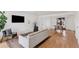 Open-concept living and dining areas showcase hardwood floors and a neutral color palette at 3440 N Harrison St, Denver, CO 80205