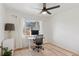 Bright home office featuring a large window, modern desk, and neutral decor at 3440 N Harrison St, Denver, CO 80205