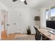 Bright home office featuring a large window, modern desk, and neutral decor at 3440 N Harrison St, Denver, CO 80205