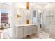 Modern bathroom featuring marble countertops, a sleek vanity, and a glass-enclosed shower at 1501 Wazee St # 4B, Denver, CO 80202