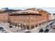 Beautiful brick building with retail space, street view, and upper-level residential units with rooftop access at 1501 Wazee St # 4B, Denver, CO 80202