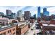 Beautiful city view showing nearby rooftops and streets of buildings under a partly cloudy sky at 1501 Wazee St # 4B, Denver, CO 80202