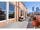 Spacious rooftop deck with city views, comfortable seating, and ample space for entertaining at 1501 Wazee St # 4B, Denver, CO 80202