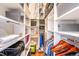 Organized walk-in closet with custom shelving, ample storage, and stylish design at 1501 Wazee St # 4B, Denver, CO 80202