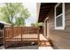 Well-maintained backyard features a wooden deck for outdoor relaxation and entertainment at 7918 Raleigh Pl, Westminster, CO 80030