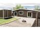 Large backyard with a shed, an outdoor fire pit, and ample space at 7918 Raleigh Pl, Westminster, CO 80030