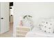 Bright bedroom featuring a modern nightstand and neutral decor at 7918 Raleigh Pl, Westminster, CO 80030