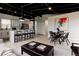 Open living space combines kitchen, dining, and living areas for seamless entertaining and daily living at 7918 Raleigh Pl, Westminster, CO 80030