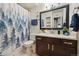 Bathroom features a toilet, vanity, and a shower at 5995 W Hampden Ave # 13G, Denver, CO 80227
