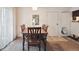 Dining room with a wooden table and chairs at 5995 W Hampden Ave # 13G, Denver, CO 80227