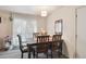 Bright dining room with decorative table and chairs at 5995 W Hampden Ave # 13G, Denver, CO 80227