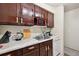 Kitchen featuring modern appliances, white countertops, and a stainless steel sink at 5995 W Hampden Ave # 13G, Denver, CO 80227