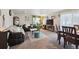 Cozy living room with sofas, area rug, and television at 5995 W Hampden Ave # 13G, Denver, CO 80227