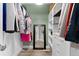 Organized walk-in closet with built-in shelving, plenty of room, and ample storage at 9675 E Kansas Cir # 45, Denver, CO 80247