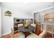 Open concept breakfast nook with hardwood floors and direct access to lower-level living room and kitchen at 9951 Winona St, Westminster, CO 80031
