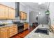 Well-equipped kitchen with wooden cabinets, granite countertops, and stainless steel appliances at 9951 Winona St, Westminster, CO 80031
